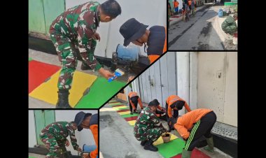 Satgas KBD Kodim 0735 Surakarta Akhiri Program dengan Pengecatan Jalan dan Saluran Air