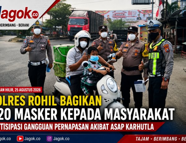 Polres Rohil Bagikan 420 Masker Cegah Dampak Asap Karhutla