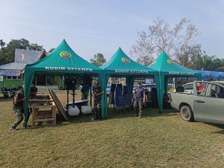 Jelang Penutupan TMMD ke-129 Kodim 0313/KPR, Satgas Gelar Persiapan Upacara di Lapangan Kantor Desa Pangkalan Terap
